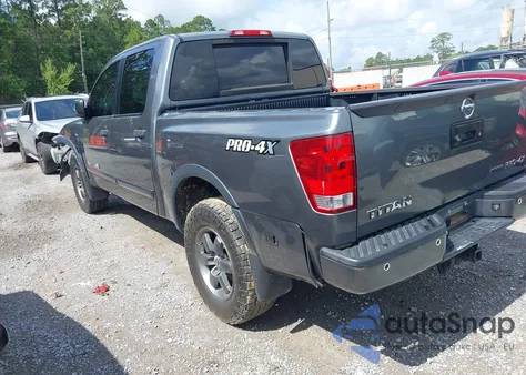2014 Nissan Titan Pro-4X z USA, uszkodzony, nr VIN 1N6BA0EC4EN509573